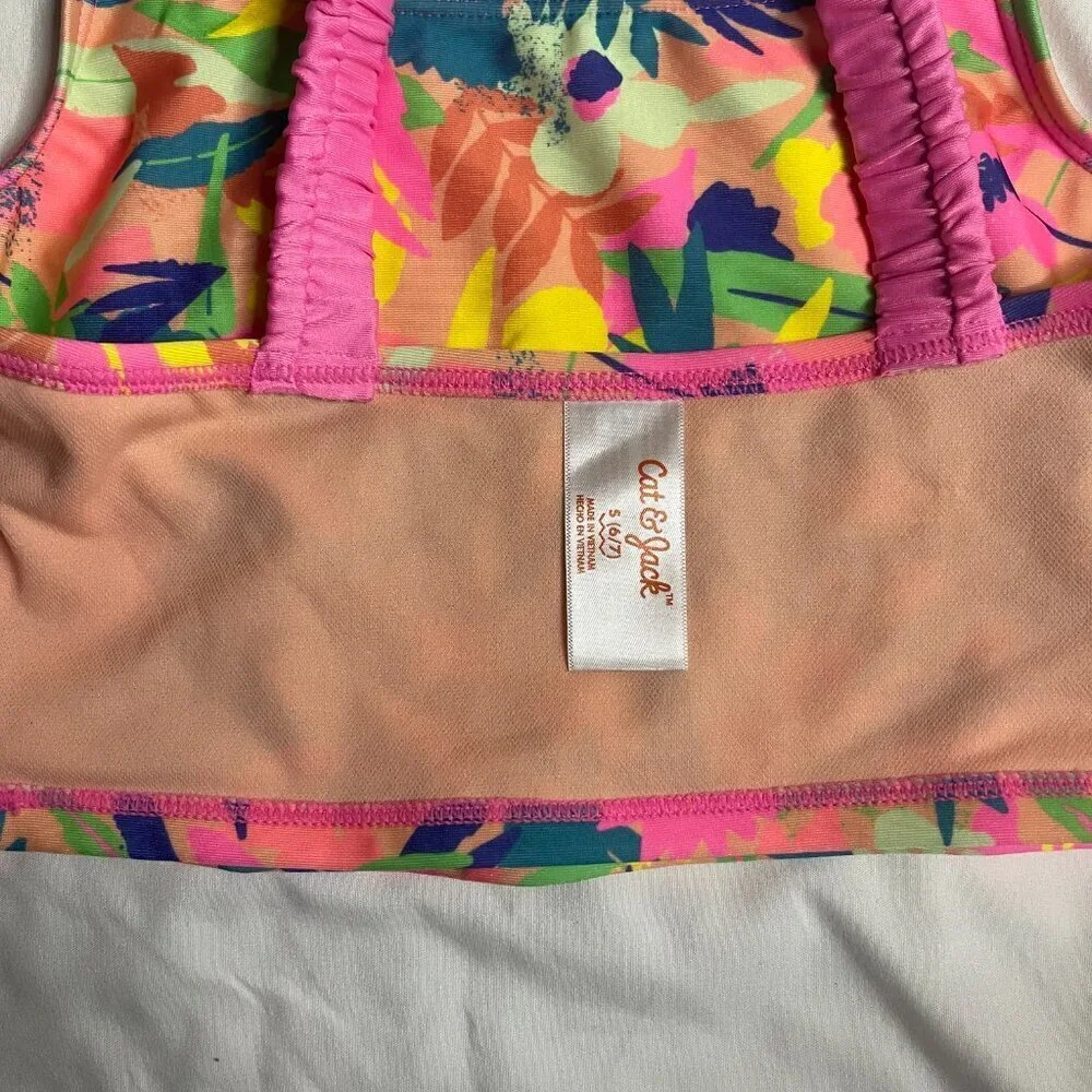 Art & Class girls' swimsuit mixed of different colors. Size S (6/7). And M (8).